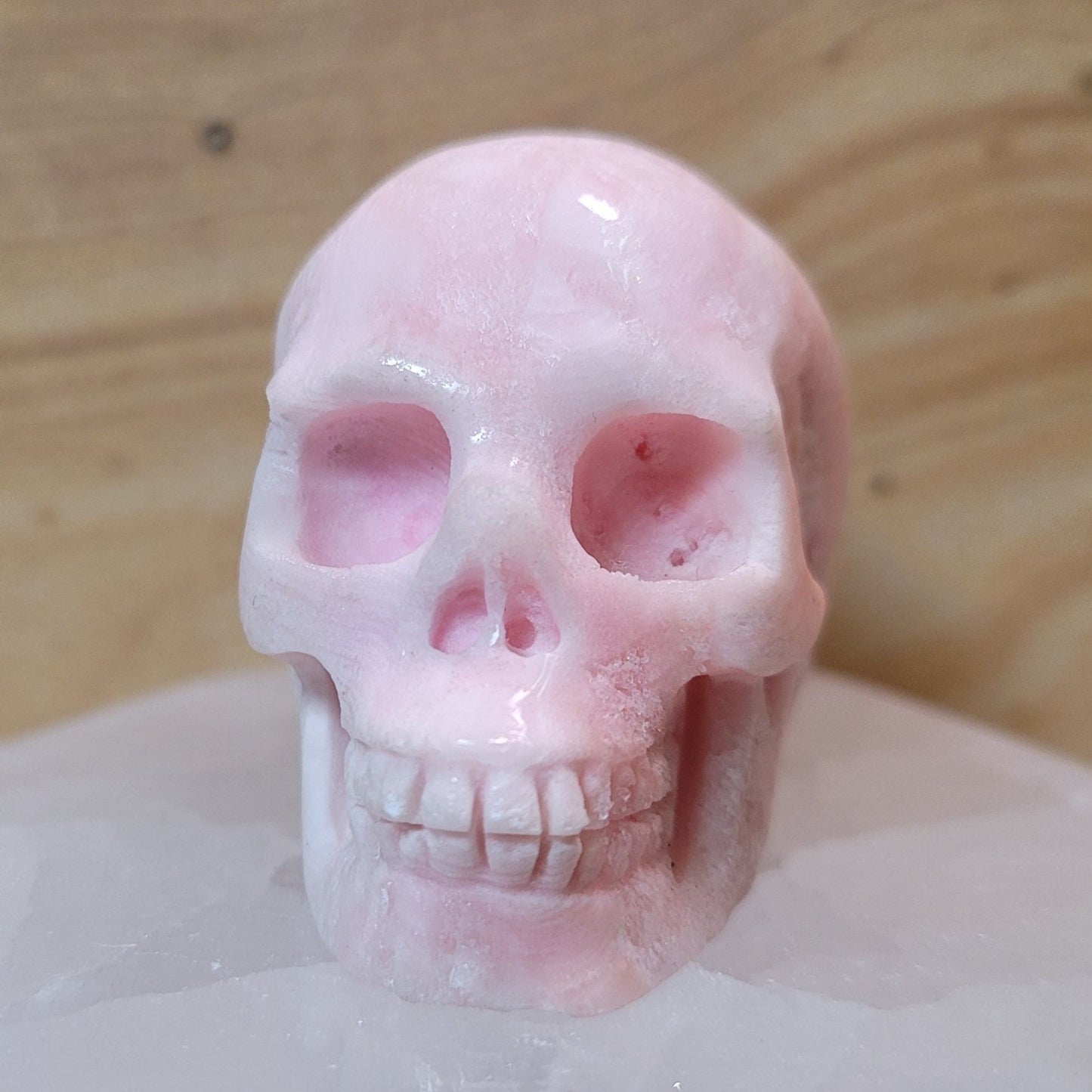 Pink Aragonite 2" Skull