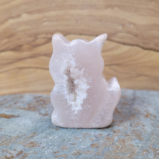 A charming Agate Druzy Cat Figurine, showcasing stunning agate formations with vibrant colors and shimmering crystalline textures, displayed against a soft, neutral background. This delightful piece symbolizes independence and creativity, making it an enchanting decorative item.