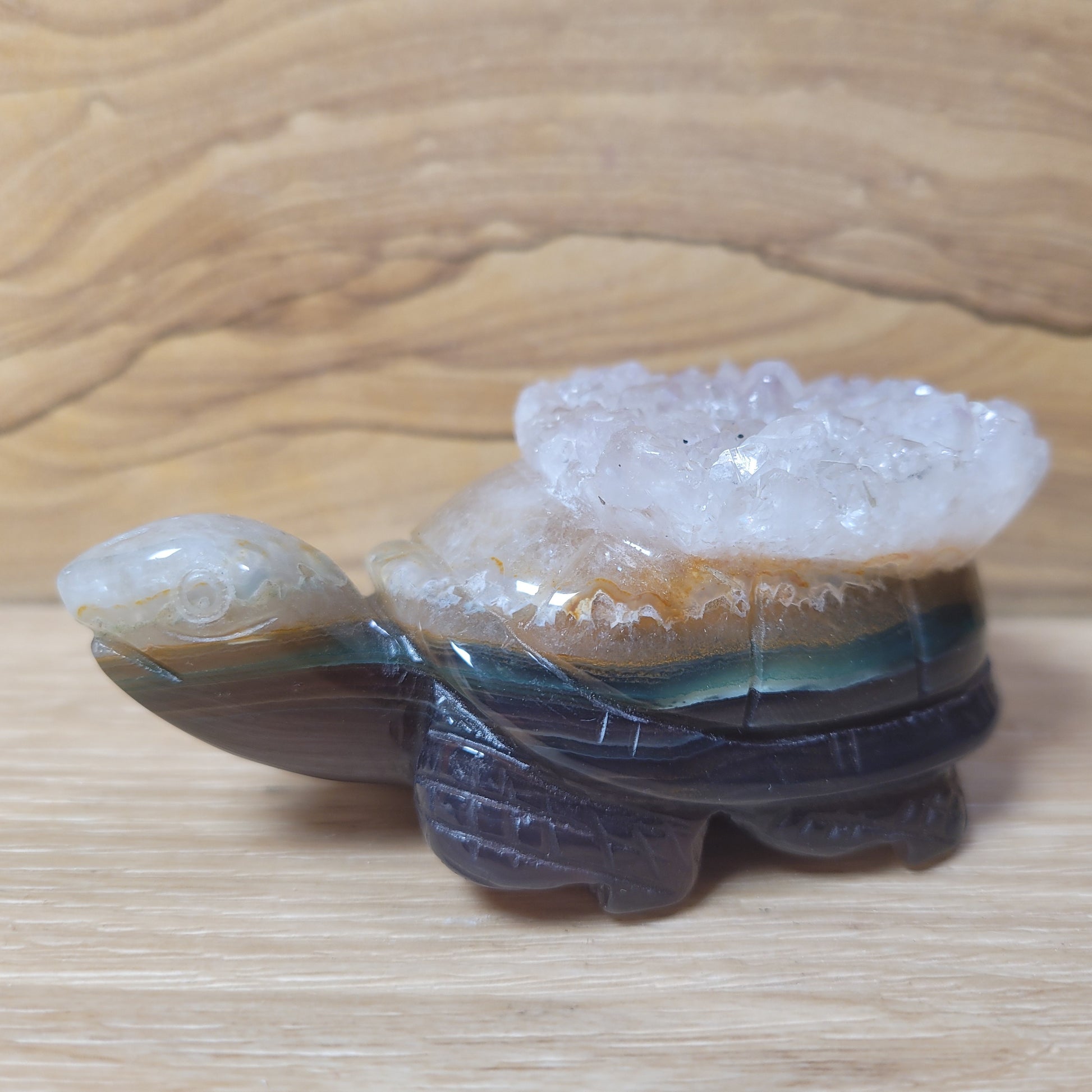 A stunning Agate Quartz Free Form, showcasing intricate banding and earthy tones with a polished, translucent surface, displayed against a soft, neutral background. This unique piece symbolizes grounding, emotional balance, and clarity, making it an elegant decorative item.