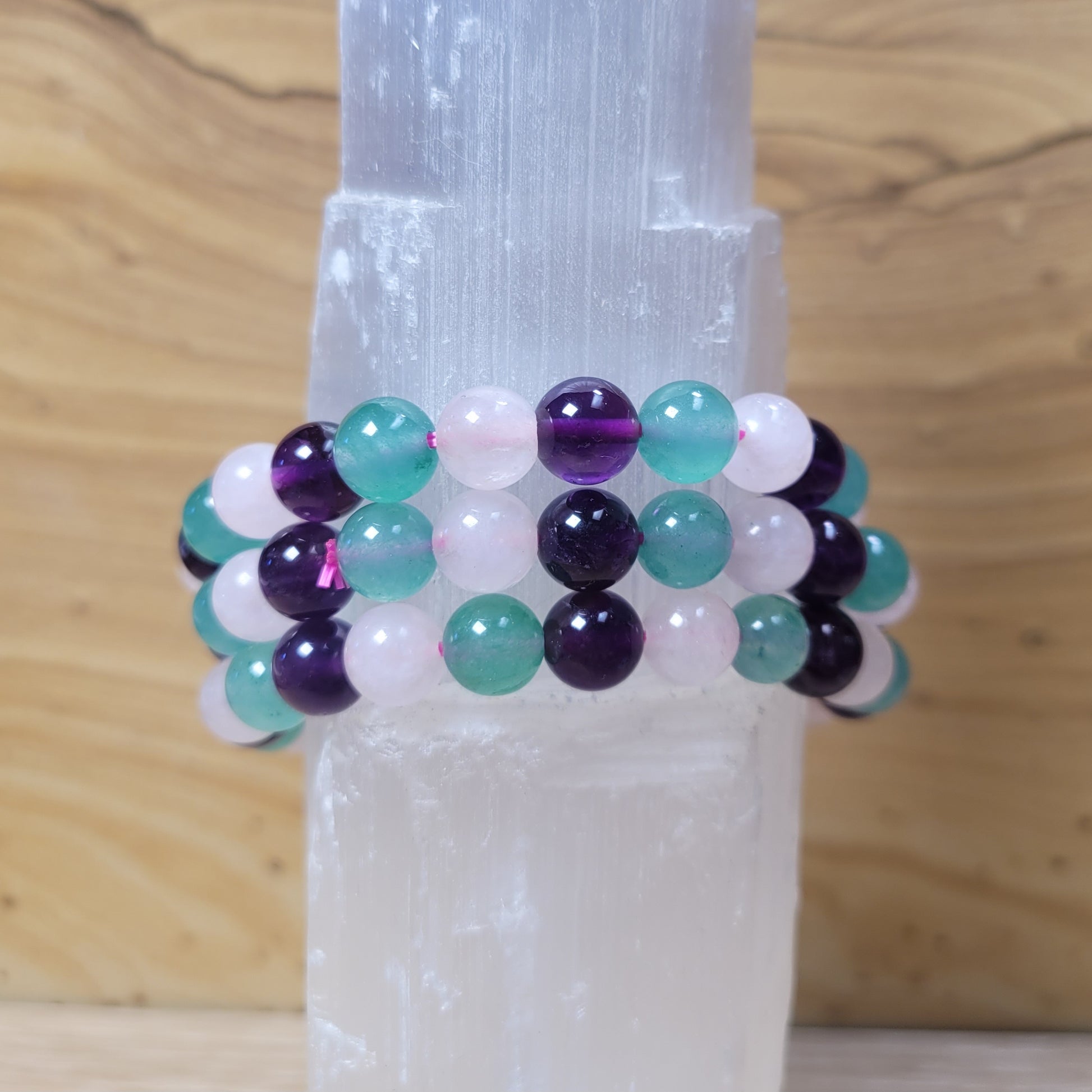 Close-up of a 6mm bracelet with vibrant, polished beads in bright colors, emphasizing the 'Positivity SWT Creation' design, showcasing the bracelet's cheerful and uplifting aesthetic.