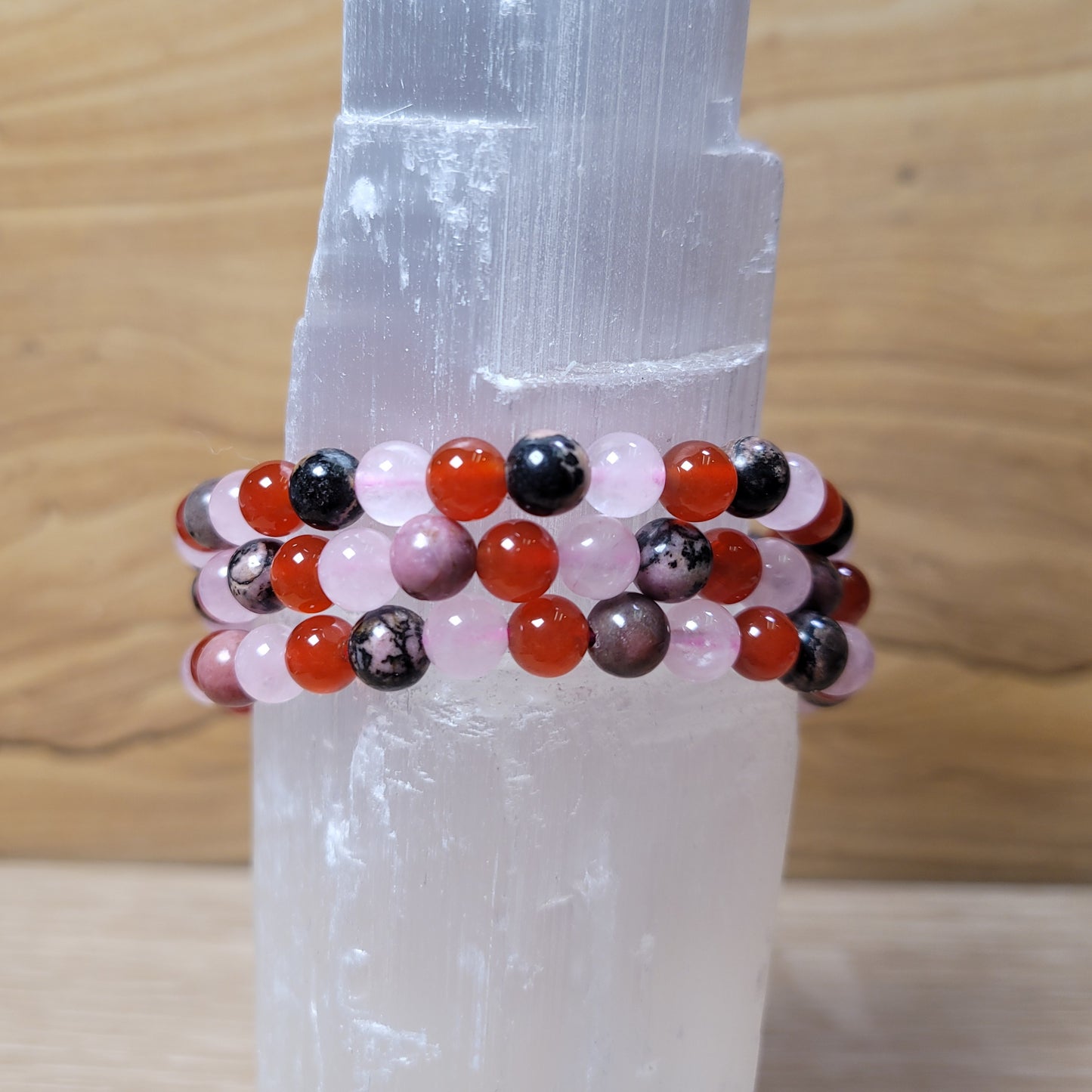 Close-up of an 6mm bracelet featuring smooth, polished beads in a variety of soothing colors, highlighting the 'Self-Love SWT Creation' design with its elegant and calming appearance.