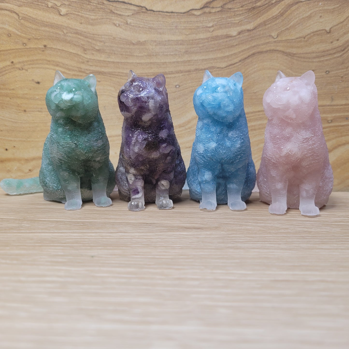 Set of charming cat figurines made from high-quality resin and contains 100% natural crystal chips. Each figure features intricate details and unique poses, capturing the playful and endearing nature of cats. Perfect for home décor or as a gift for cat lovers.