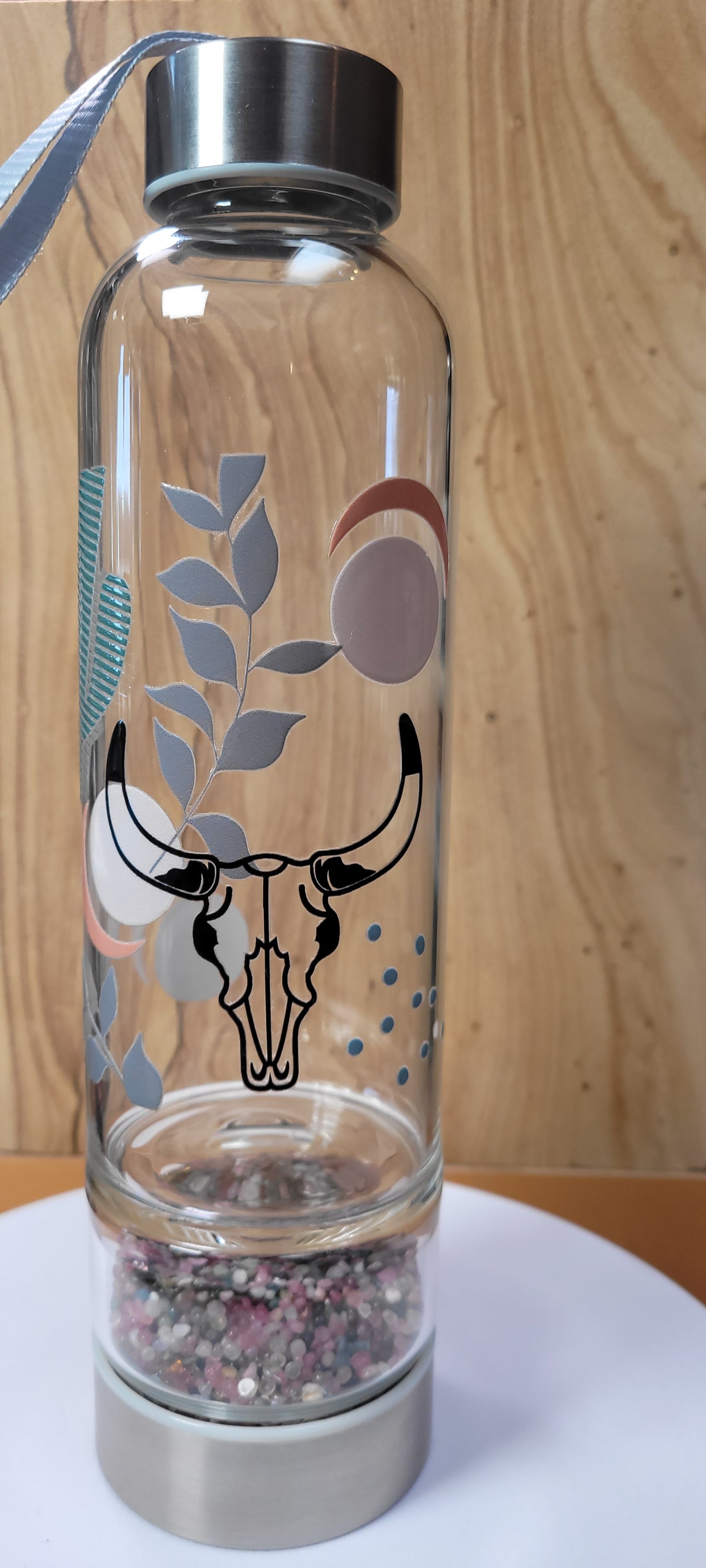 Cow Skull Glass Water Bottle – Stay hydrated in style with this unique glass water bottle featuring a distinctive cow skull design. Made from durable glass, it keeps your drinks pure and fresh while adding a touch of rustic charm to your daily routine. Perfect for home, office, or on-the-go use.